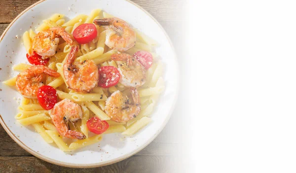 Penne pasta with shrimps — Stock Photo, Image