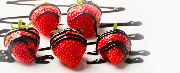 Strawberries dipped in chocolate sauce