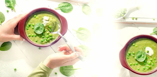 Woman hands with Bowl of pea soup. — Stock Image Woman hands with Bowl of pea soup. Stock Photo