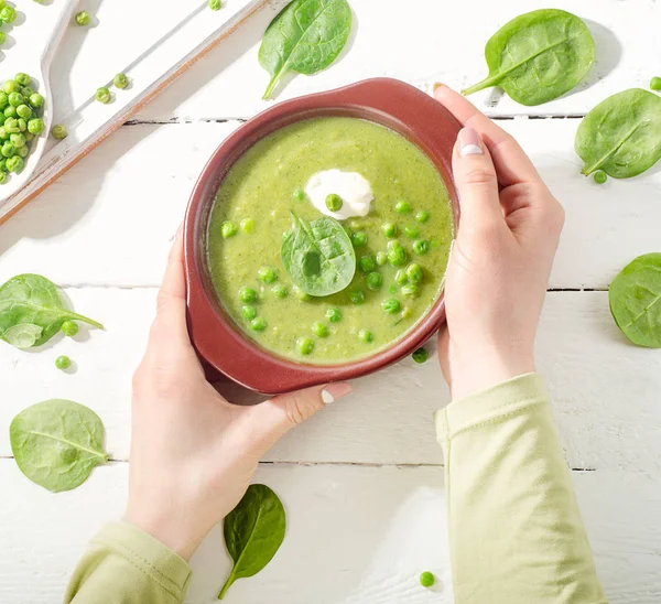 Woman hands holding a Bowl of soup. — Stock Image Woman hands holding a Bowl of soup. Royalty Free Stock Images