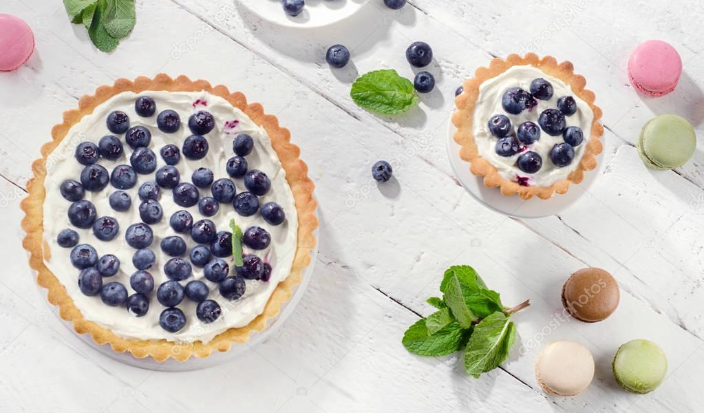 Cakes with blueberries and whipped cream 