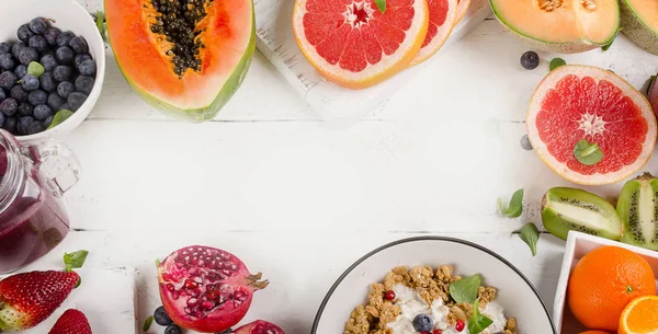 Fresh fruits on a white — Stock Photo, Image