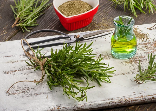 Fresh and dried Rosemary  and oil — Stock Photo, Image