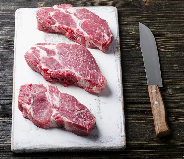 Ruwe varkensvlees steaks — Stockfoto