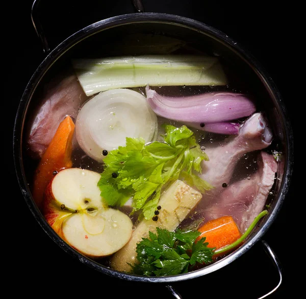 Ingredients of healthy soup in pot. — Stock Photo, Image