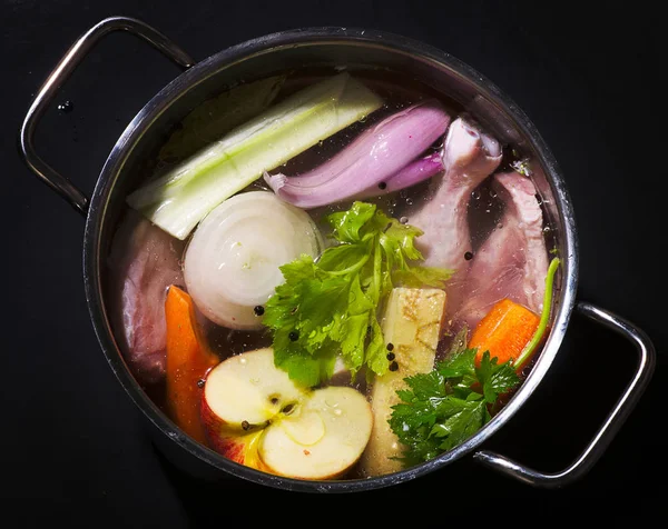 Ingredients of healthy soup in pot. — Stock Photo, Image