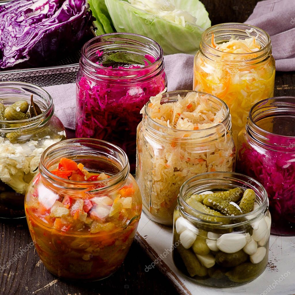 Tasty Fermented vegetables in jars — Stock Photo © bit245 173075382