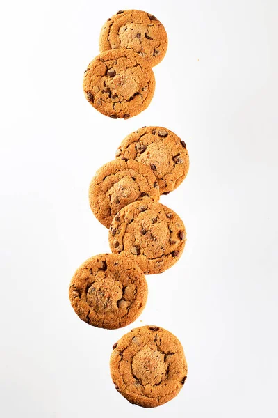Chocolate chips falling in motion — Stock Photo, Image
