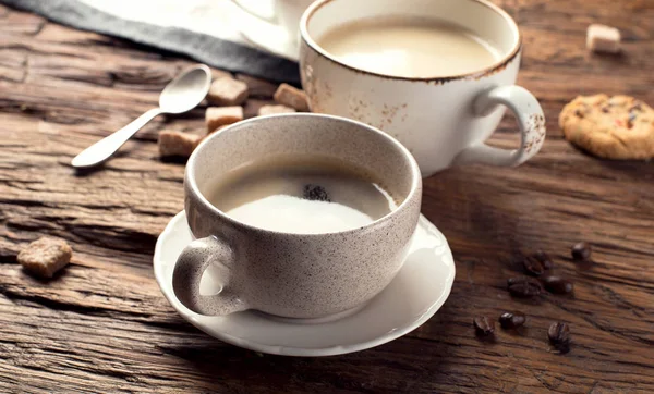 Coffee cups  on a rustic background. — Stock Photo, Image