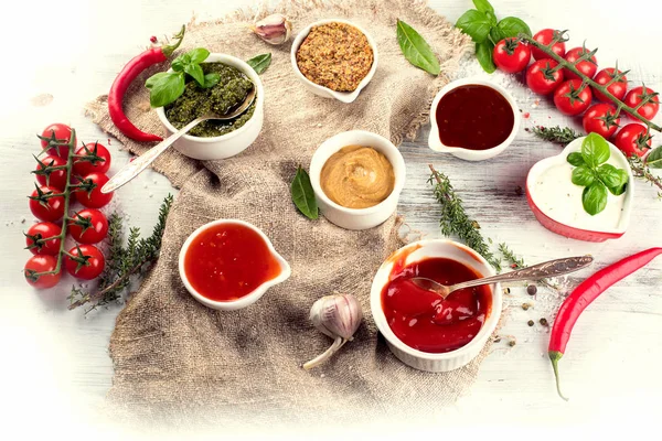 Different sauces in bowls — Stock Photo, Image