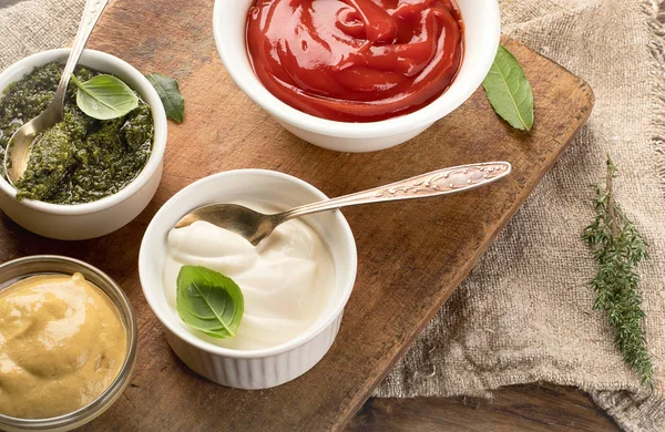 Bowls of various sauces — Stock Photo, Image