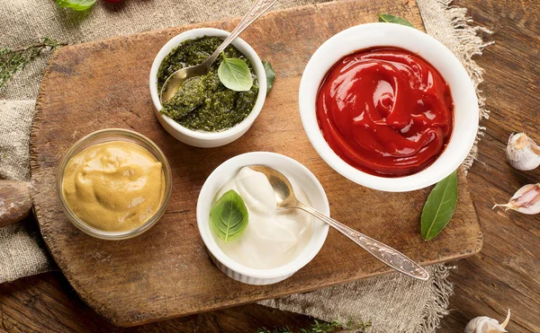 Bowls of various sauces — Stock Photo, Image