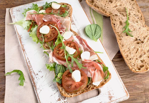 Sandwich Ciabatta Prosciutto Cheese Lettuce Top View — Stock Photo, Image