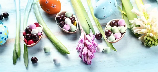 Flowers with easter eggs — Stock Photo, Image