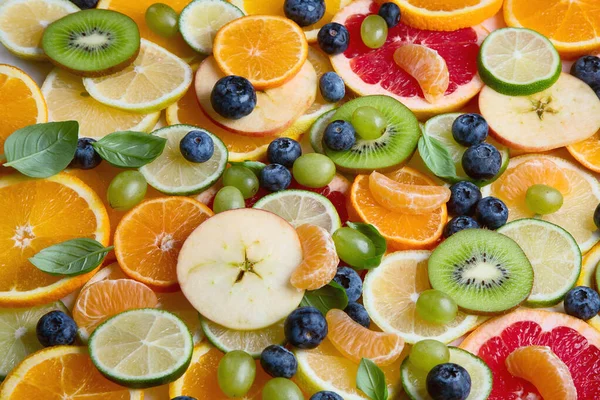 Свіжі фрукти барвистий фон — стокове фото