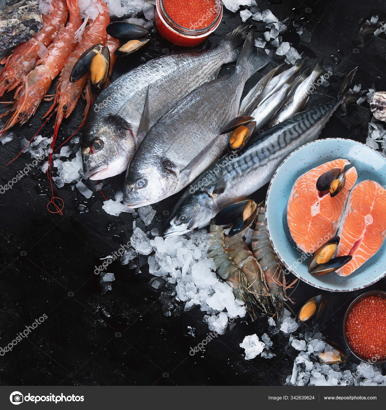 Fresh Fish Seafood Black Background Top View Copy Space Stock Photo by