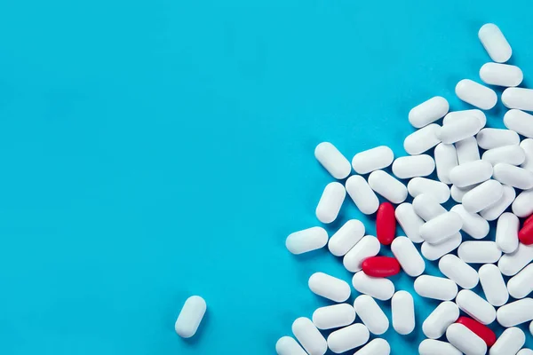 Heap Pills Blue Background Top View Copy Space — Stock Photo, Image