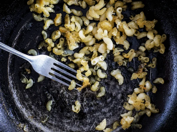Зіпсована їжа сковорідка — стокове фото