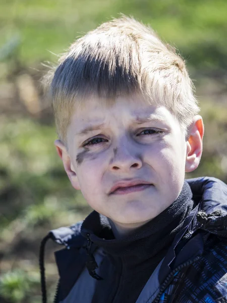 Boy smeared with soot — Stock Photo, Image