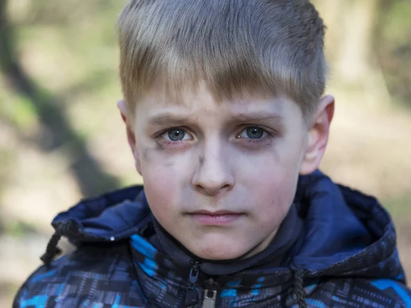 Boy smeared with soot — Stock Photo, Image