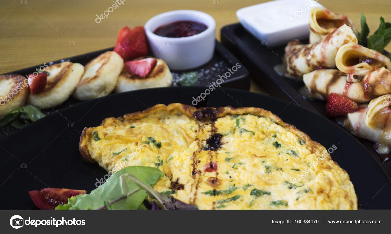 omele pancakes andi cheesecakes stock photo igorgolovniov