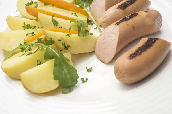 Sausages with boiled potatoes — Stock Photo, Image