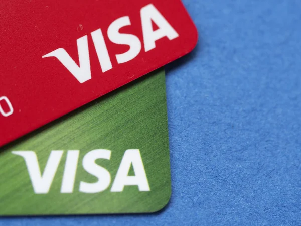 Visa bank cards on a dark blue background — 스톡 사진