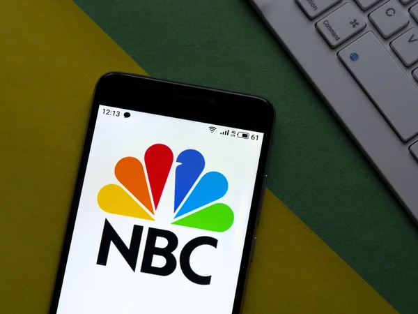 In this photo illustration the NBC TV Network logo is seen displ — 스톡 사진
