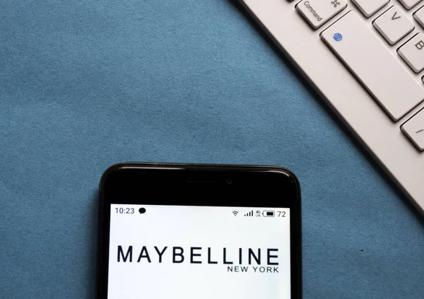 In this photo illustration the Maybelline New York logo is seen — 스톡 사진