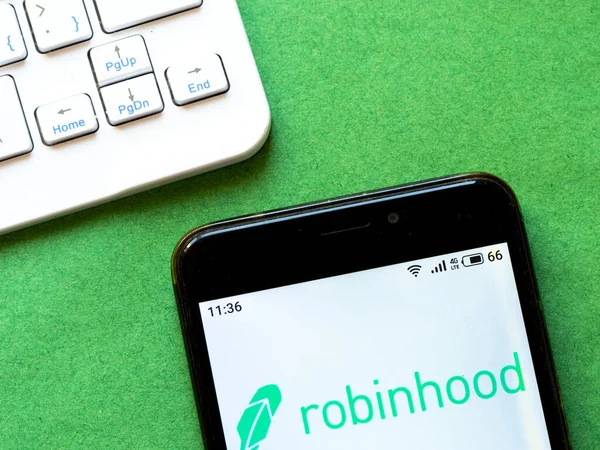 Bu resimde Robinhood logosu akıllı telefondan gösteriliyor.