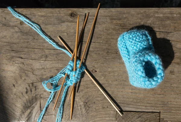 Knitting of socks of blue wool — Stock Photo, Image