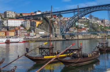 Traditional boats on Douro river in Porto clipart