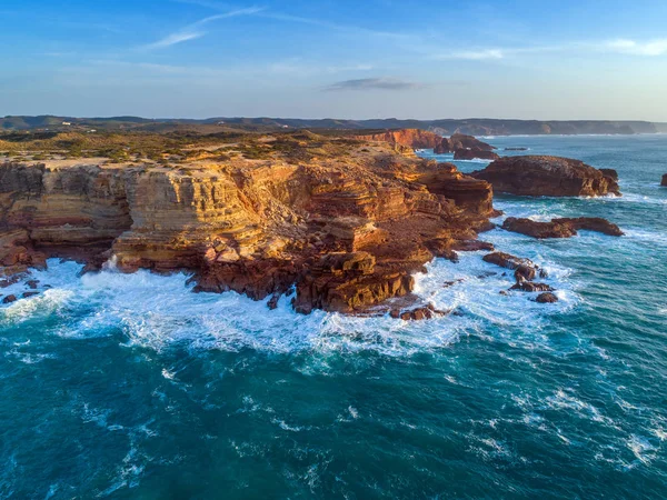 Aerial view on rock cliffs and waves — Stockfoto