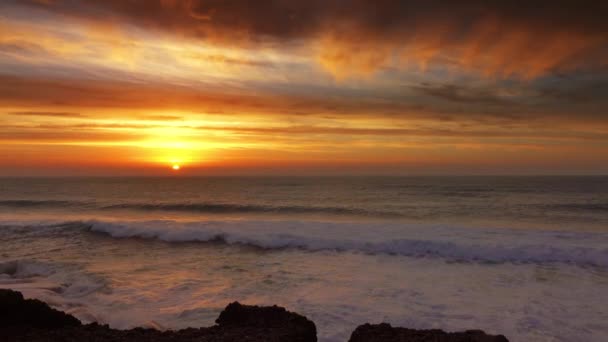 Big waves of Atlantic ocean and sunset sun — 비디오