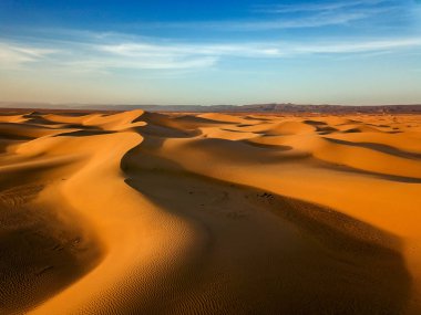 Aerial landscape with sand dunes in Sahara desert clipart