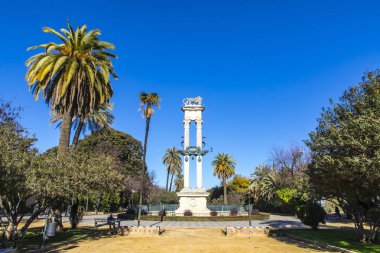 Columbus Monument in Jardines de Murillo, Seville, Spain clipart