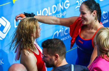 KYIV, UKRAINE - AUGUST 6, 2019: Sofiia LYSKUN of Ukraine (L) accepts congratulations on victory after the Womens 10m Platform Final of the 2019 European Diving Championship in Kyiv, Ukraine