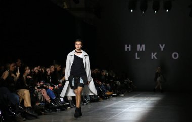 Kyiv, Ukraine - February 5, 2020: Model presents a collection of clothes by designer HMYLKO during the 46th Ukrainian Fashion Week season Fall/Winter 2020/21 at Mystetskyi Arsenal in Kyiv