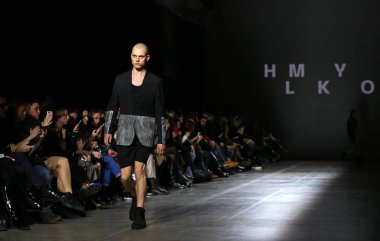 Kyiv, Ukraine - February 5, 2020: Model presents a collection of clothes by designer HMYLKO during the 46th Ukrainian Fashion Week season Fall/Winter 2020/21 at Mystetskyi Arsenal in Kyiv