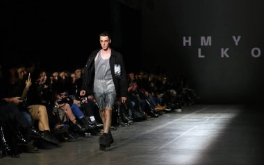 Kyiv, Ukraine - February 5, 2020: Model presents a collection of clothes by designer HMYLKO during the 46th Ukrainian Fashion Week season Fall/Winter 2020/21 at Mystetskyi Arsenal in Kyiv
