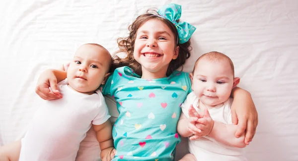 Sister with twins — Stock Photo, Image