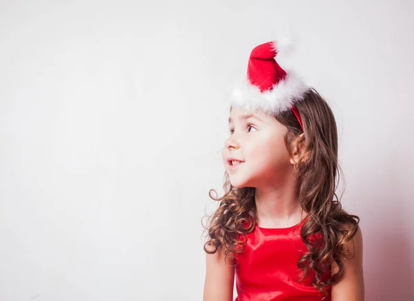 Dívka v Santa hat čelenka — Stock fotografie