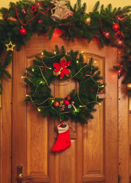 Christmas wreath on door — Stock Photo, Image