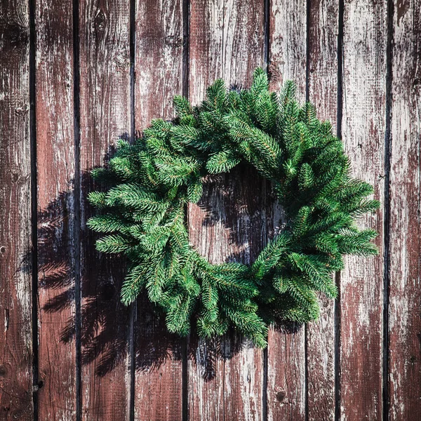 Christmas wreath on the wall Royalty Free Stock Images