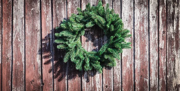 Christmas wreath on the wall Royalty Free Stock Images