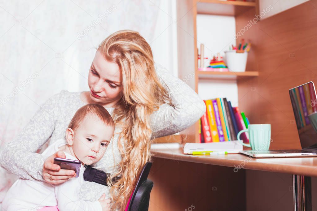 Freelance worked mom with baby