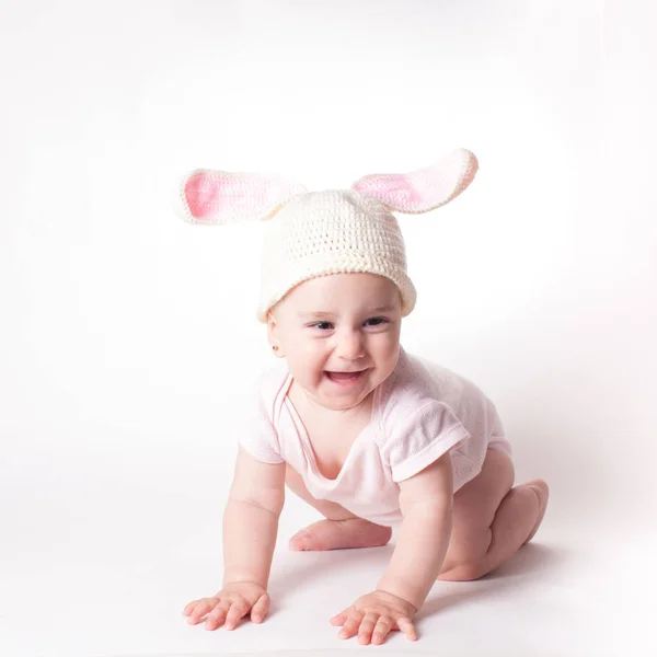 Baby girl in a rabbit hat — Stock Photo, Image