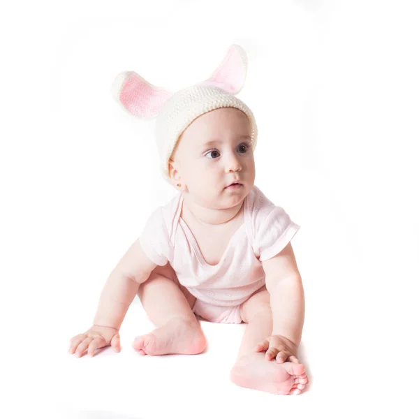 Baby girl in a rabbit hat — Stock Photo, Image