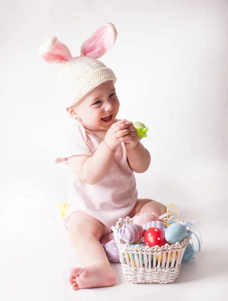 Baby girl in a rabbit hat — Stock Photo, Image