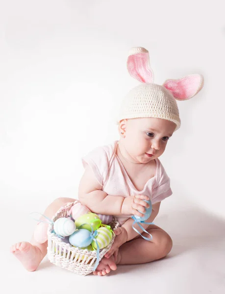 Baby girl in a rabbit hat — Stock Photo, Image